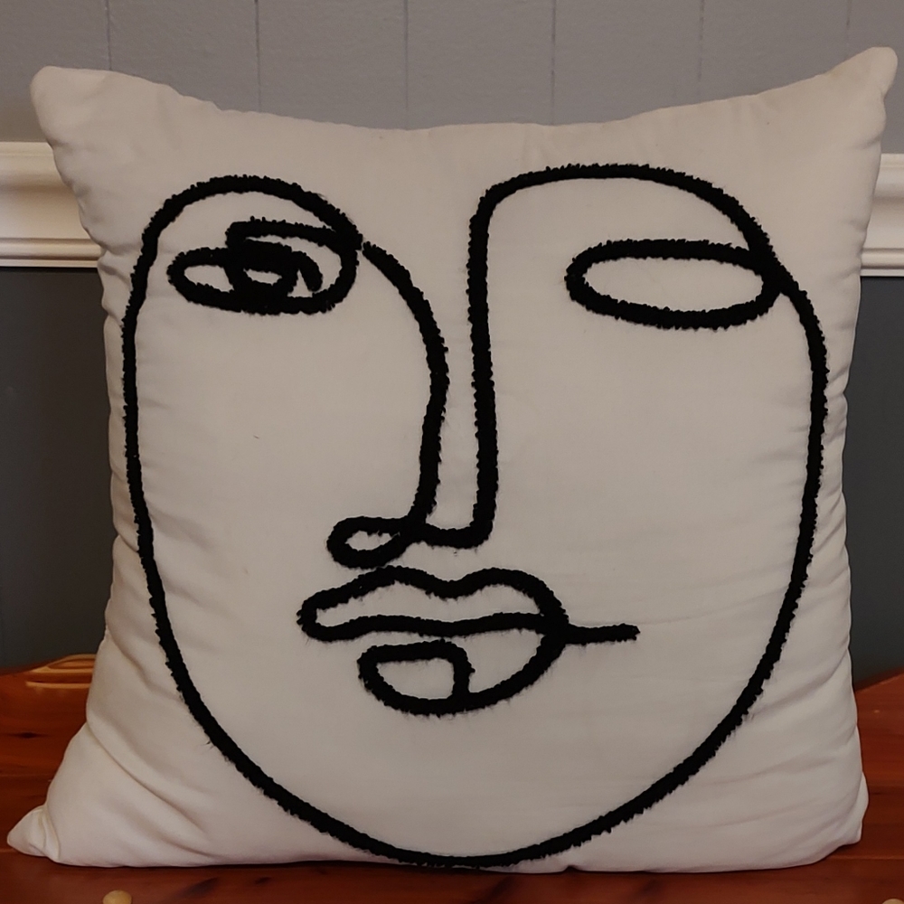 Face throw pillow